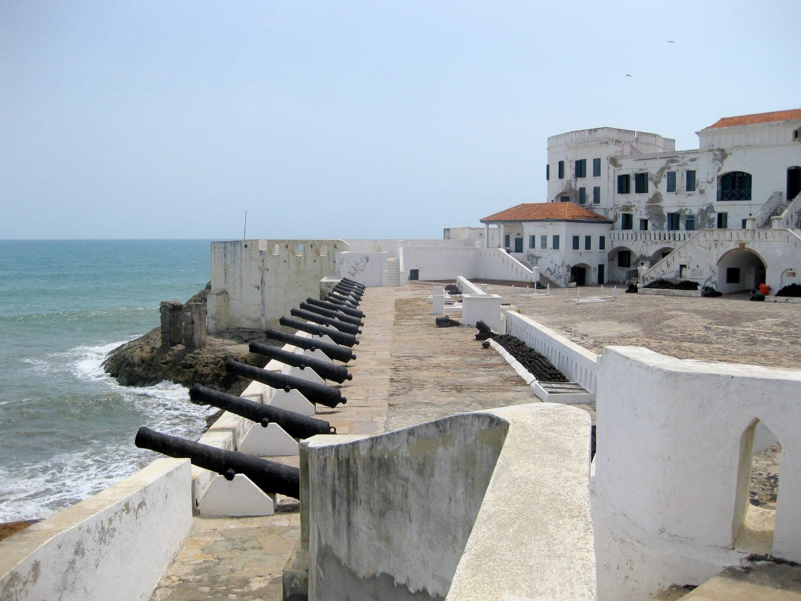 Cannons along the ramparts of Cape Coast Castle, facing the sea.