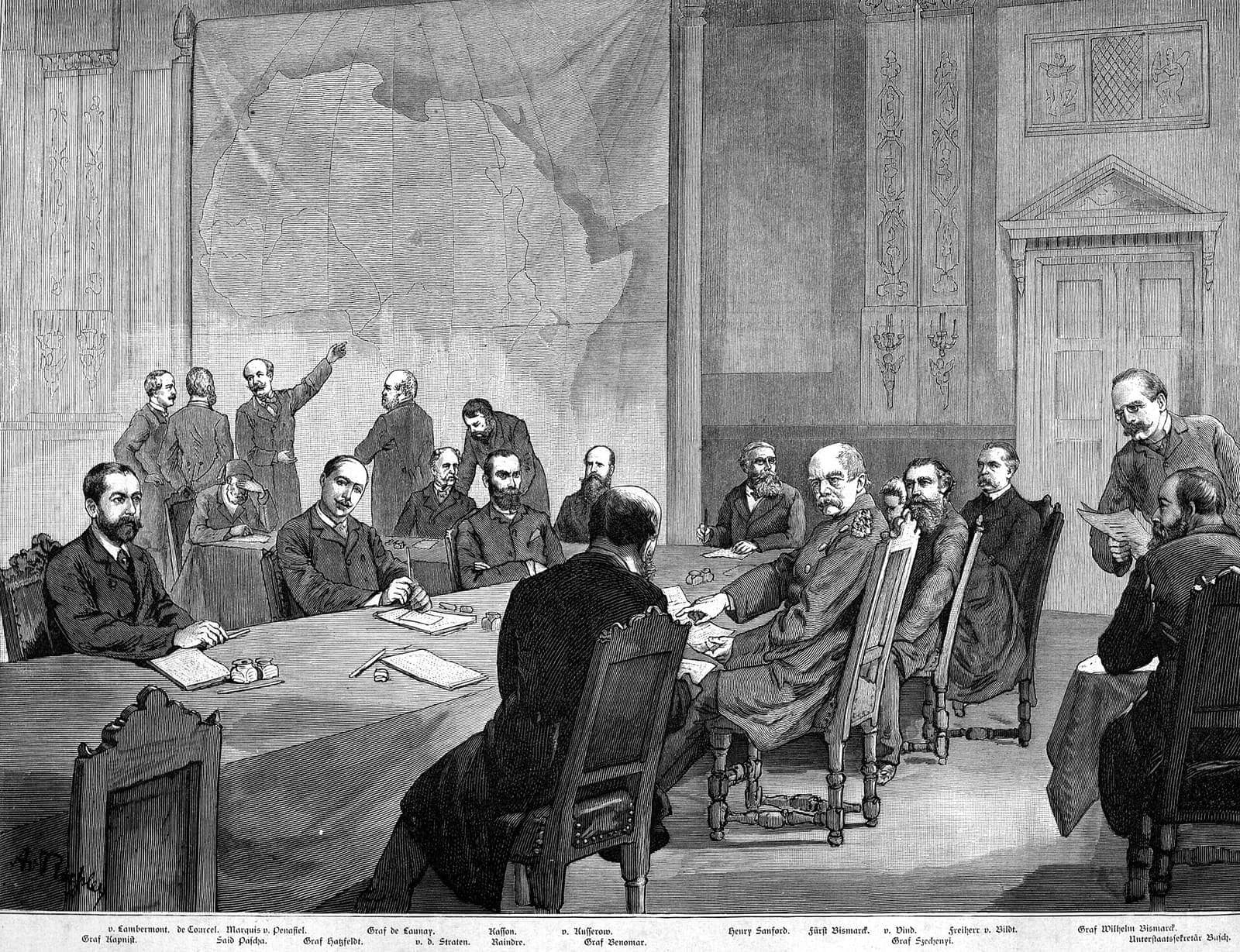 An engraving of delegates seated around a long table in a nineteenth-century hall.